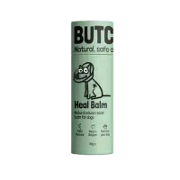 Thumbnail 200x200 for Envase del bálsamo Butchcare Heal Balm, un producto natural para la reparación de heridas en perros. Diseño minimalista en color verde claro con ilustración de un perro vendado y texto en negro.