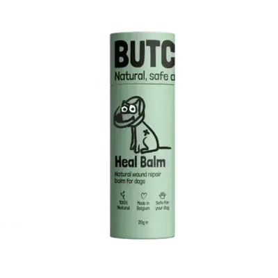 Thumbnail 400x400 for Envase del bálsamo Butchcare Heal Balm, un producto natural para la reparación de heridas en perros. Diseño minimalista en color verde claro con ilustración de un perro vendado y texto en negro.