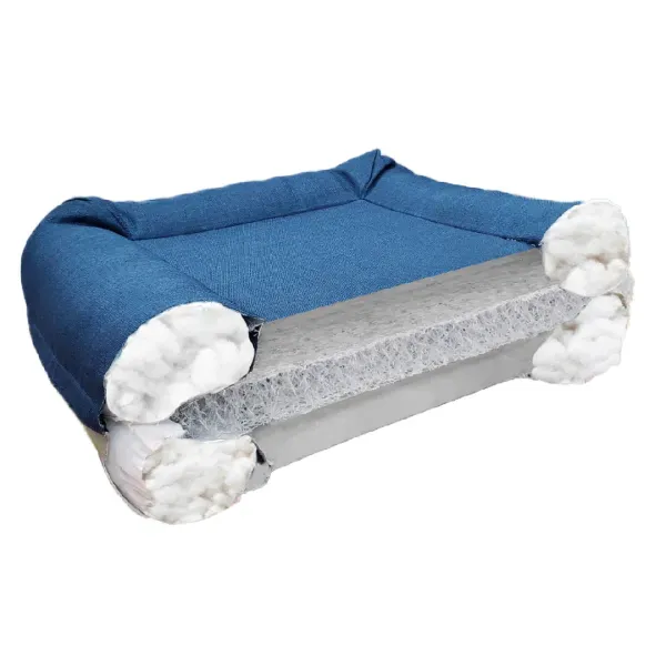 Cama ortopédica para perros de color azul con estructura interna visible, mostrando capas de soporte ergonómico.