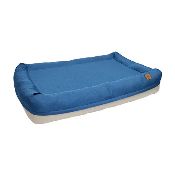 Cama ergonómica para perros de color azul, fabricada con materiales hipoalergénicos y reciclados. Ideal para aliviar la presión articular.